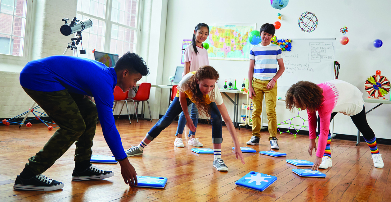 code in motion, kids setting up game