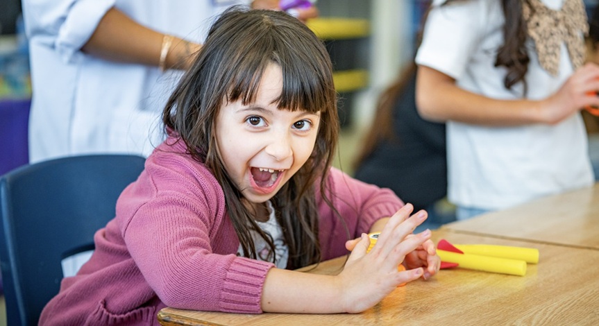 Mad Science kid with air blasters take home photo
